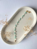 Bracelet en perles – Fleur vertes & blanches